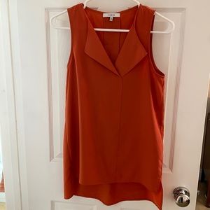 Orange tunic blouse
